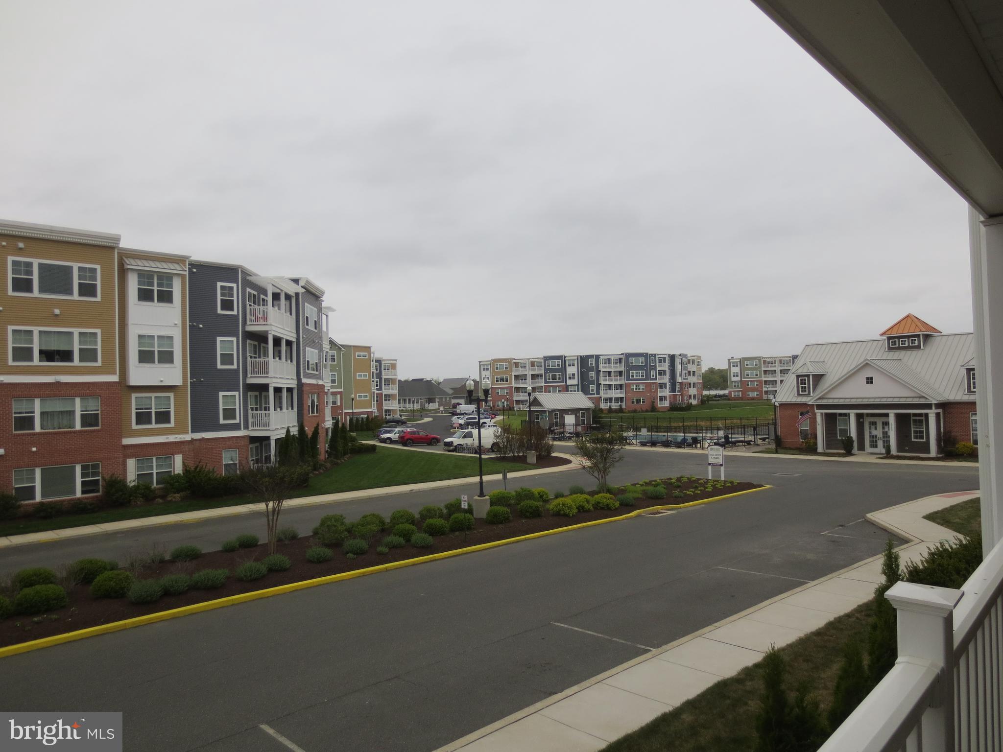 24238 Zinfandel Lane, Unit R201 Lewes, DE 19958 - Photo 2 of 29 Balcony view of the neighborhood