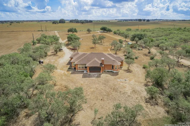 a view of a yard with an outdoor space