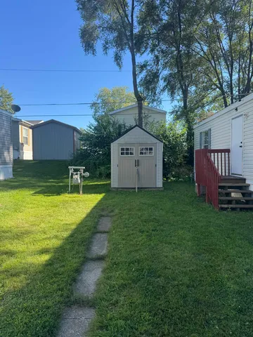 a view of a back yard with green space