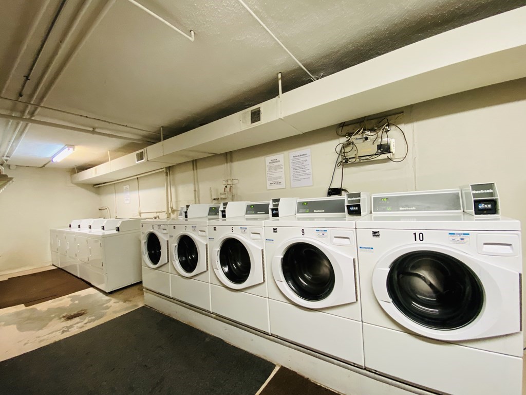 50 Green Street, Unit 209 Brookline, MA 02446 - Photo 13 of 16 a utility room with dryer and washer