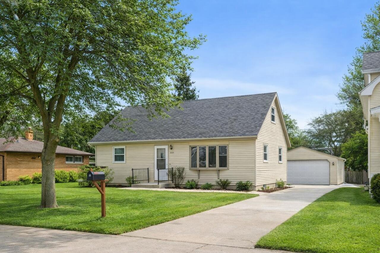 1135 North 27th Street Sheboygan, WI 53081 - Photo 2 of 30 Certain images may contain digital enhancements, virtual staging, or altered elements for marketing purposes. Such images are illustrative only and do not represent exact current conditions of the property. Buyers should rely on their own inspections and due diligence