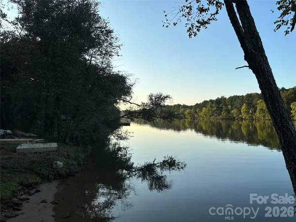 a view of a lake from a balcony