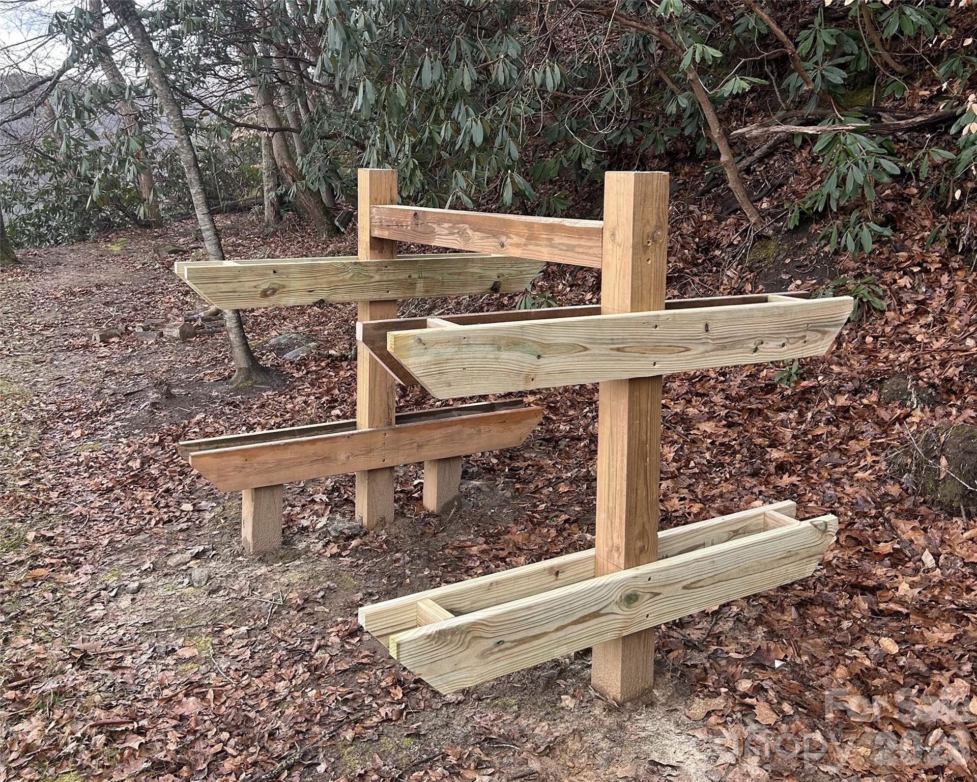 1800 Hilferty Road Hickory, NC 28601 - Photo 20 of 20 a view of a fireplace with a table and chair