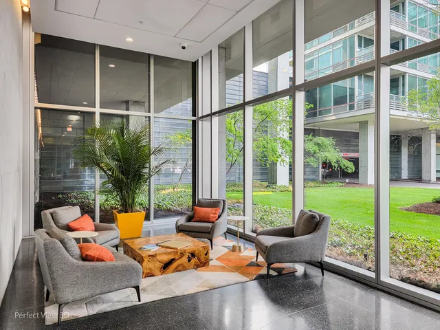 a outdoor space with patio the couches and a dining table with garden view
