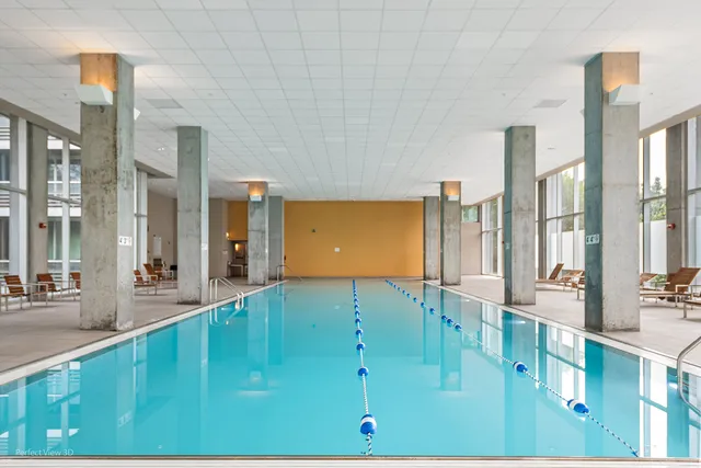 a view of a living room and kitchen