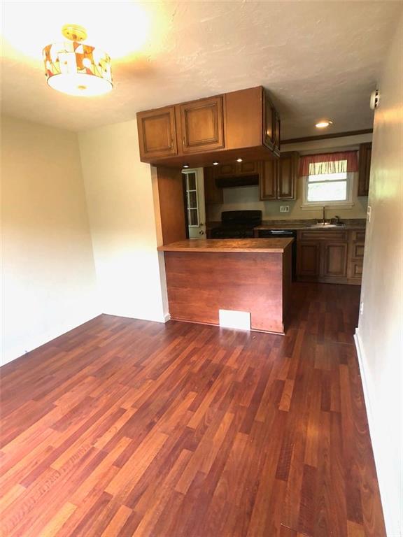 443 Filmore Road Pittsburgh, PA 15221 - Photo 4 of 22 Dining Room looking into Kitchen