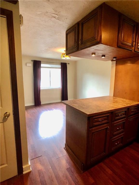 443 Filmore Road Pittsburgh, PA 15221 - Photo 5 of 22 Kitchen opens to dining room.