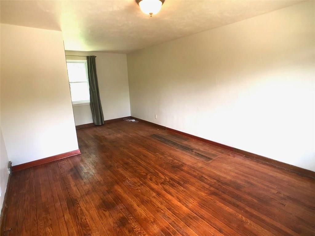 443 Filmore Road Pittsburgh, PA 15221 - Photo 7 of 22 Living Room with Hardwood Floor