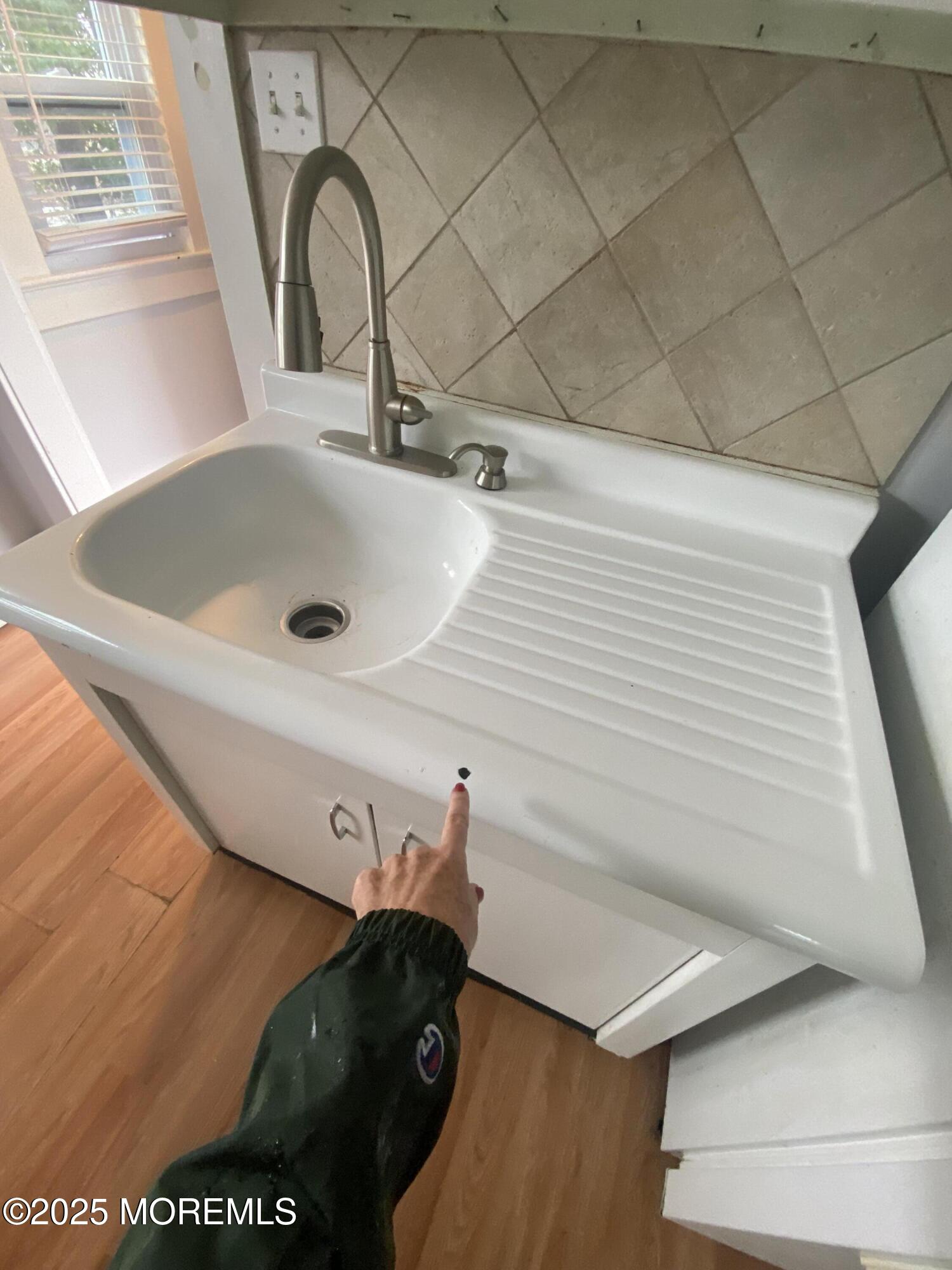 309 Hume Street Allenhurst, NJ 07711 - Photo 34 of 77 a close view of sink