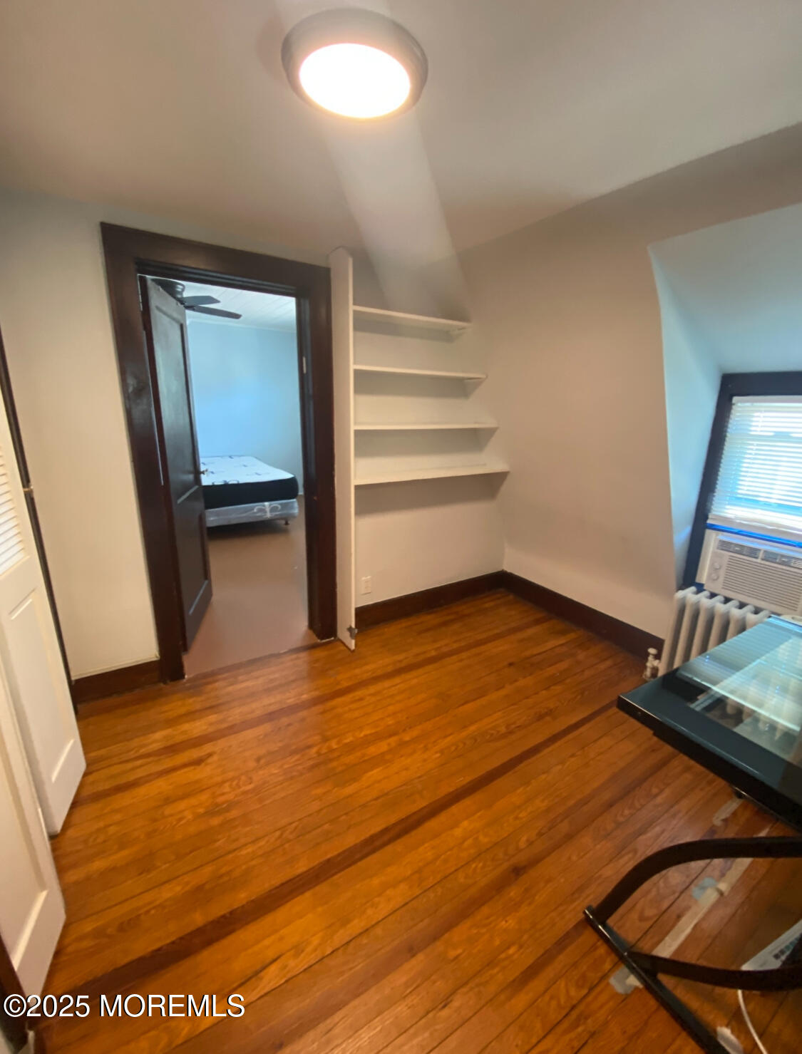 309 Hume Street Allenhurst, NJ 07711 - Photo 6 of 77 a view of a room with wooden floor and chair