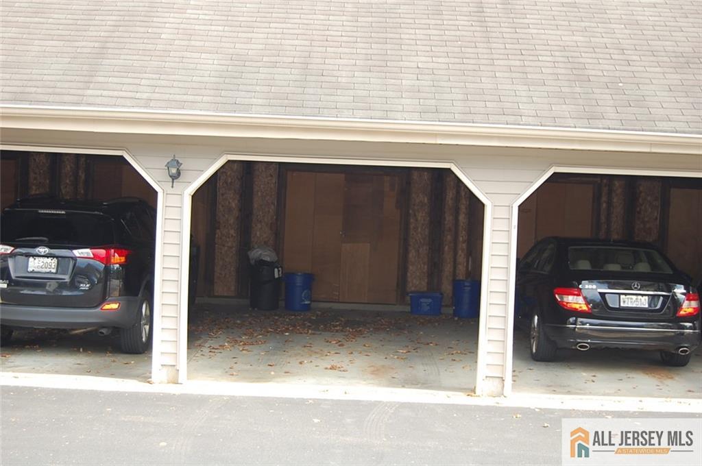 124 Concordia Circle, Unit 124C Monroe Township, NJ 08831 - Photo 21 of 21 a view of a car garage