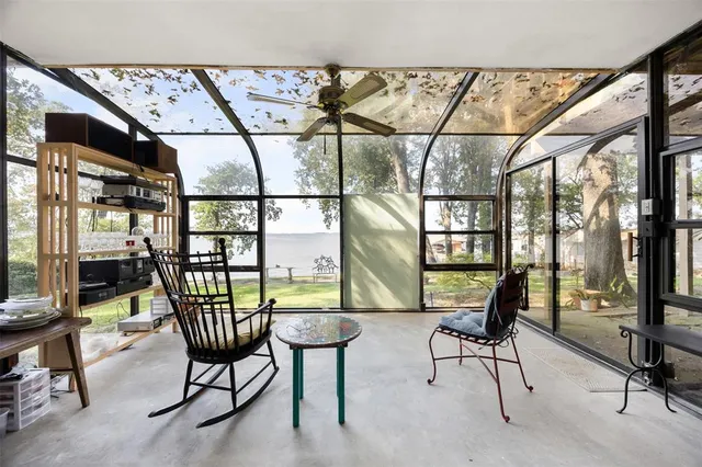 a view of a livingroom with furniture and a table
