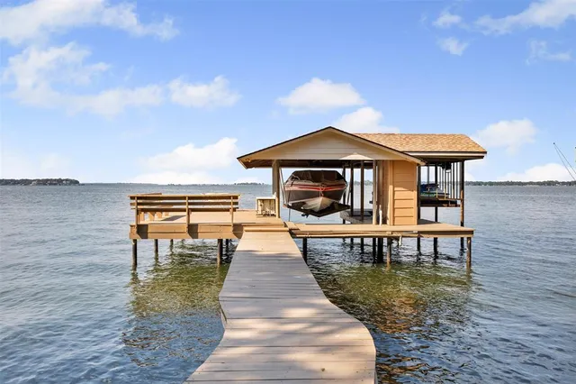 a view of swimming pool with lounge chair