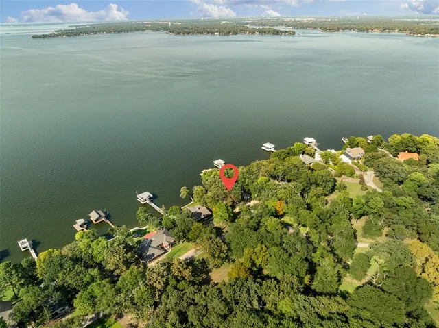 a view of a lake with a garden