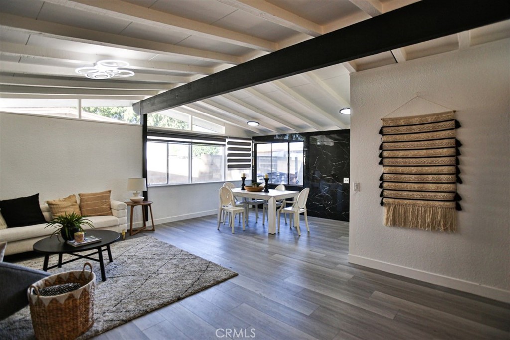 2540 West Picadilly Way Anaheim, CA 92801 - Photo 18 of 37 a living room with furniture and a wooden floor