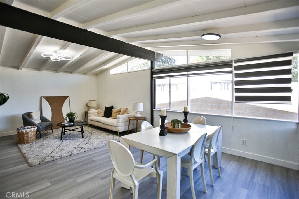 2540 West Picadilly Way Anaheim, CA 92801 - Photo 4 of 37 a view of a dining room with furniture window and wooden floor