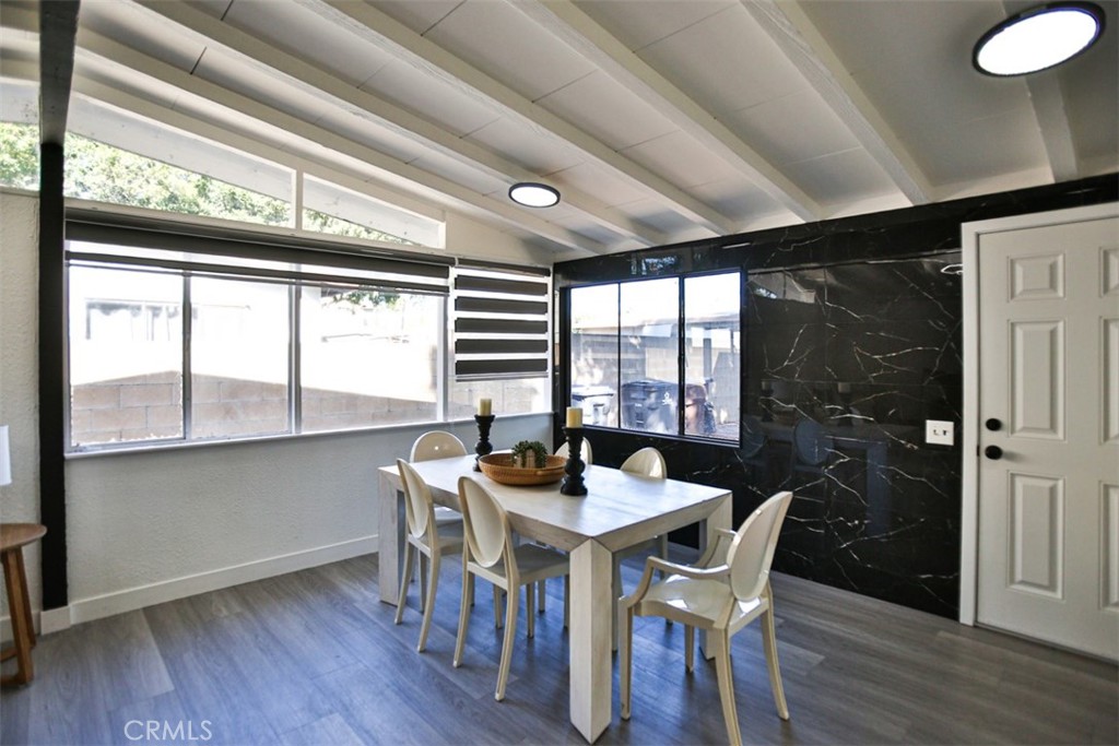2540 West Picadilly Way Anaheim, CA 92801 - Photo 5 of 37 a dining room with furniture window and wooden floor