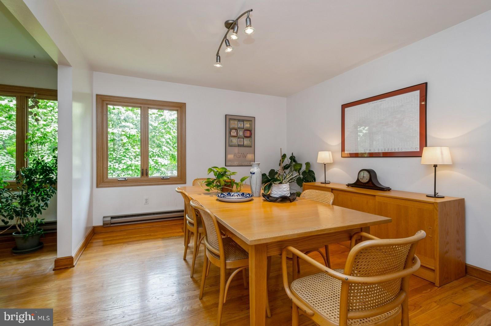 81 Copper Mine Road Princeton, NJ 08540 - Photo 24 of 44 a view of a dining room with furniture and wooden floor