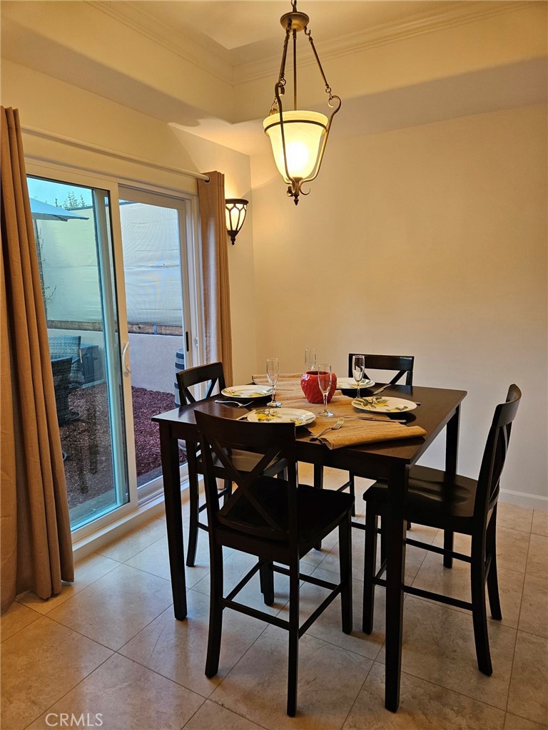 10424 Big Tujunga Canyon Road Tujunga, CA 91042 - Photo 14 of 54 a view of a dining room with a table and chairs