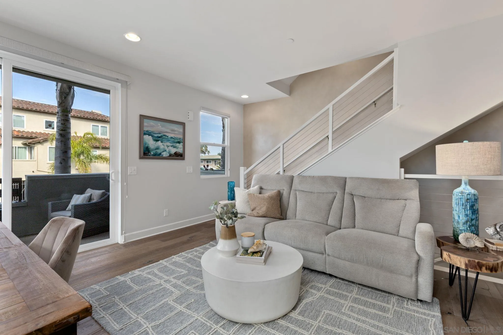 2521 State Street Carlsbad, CA 92008 - Photo 11 of 30 a living room with furniture and a potted plant