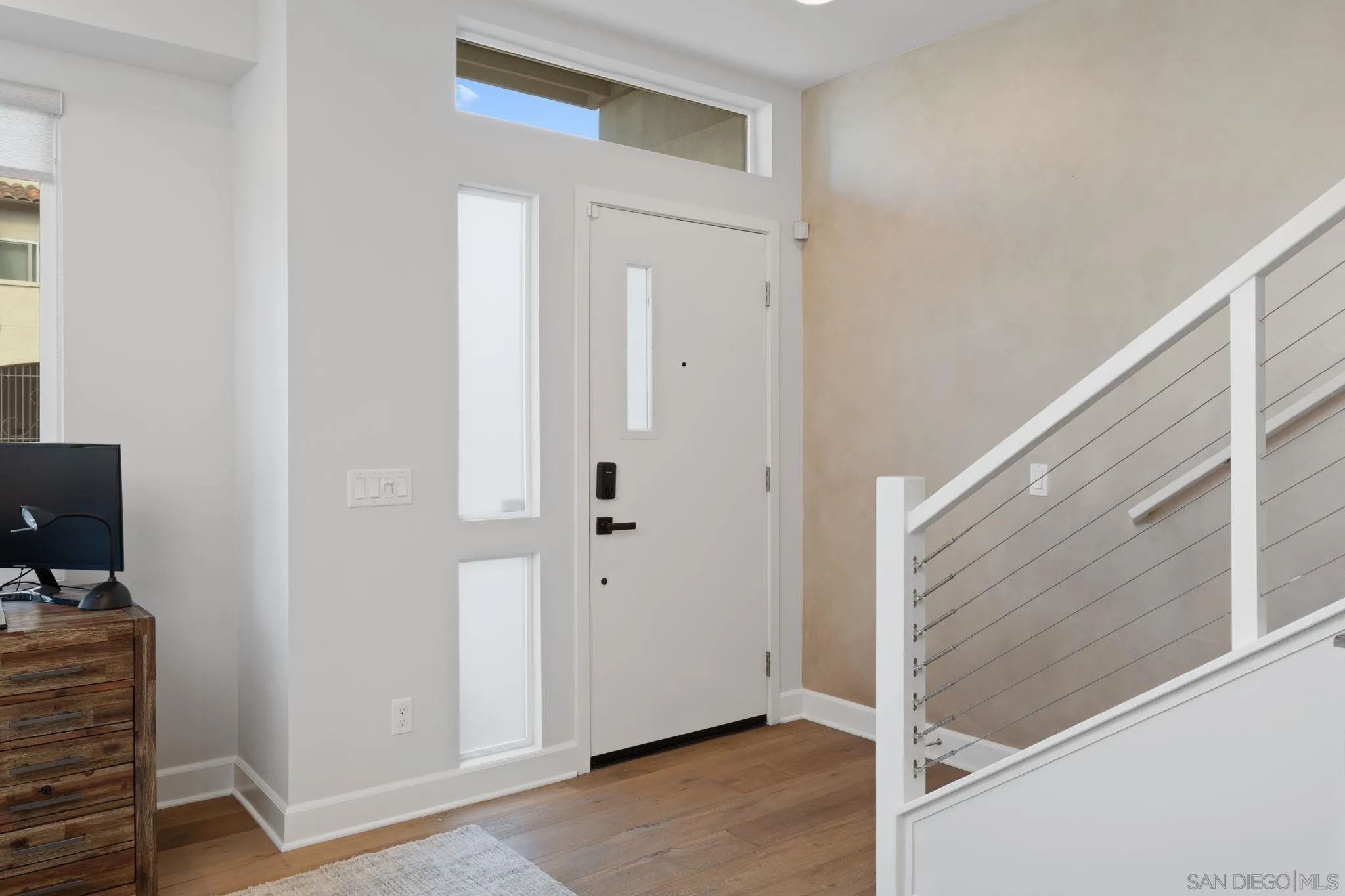2521 State Street Carlsbad, CA 92008 - Photo 4 of 30 a view of a hallway with workspace