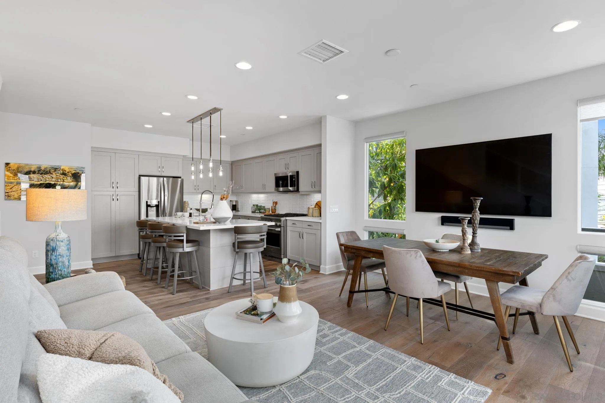 2521 State Street Carlsbad, CA 92008 - Photo 9 of 30 a living room with furniture and a flat screen tv
