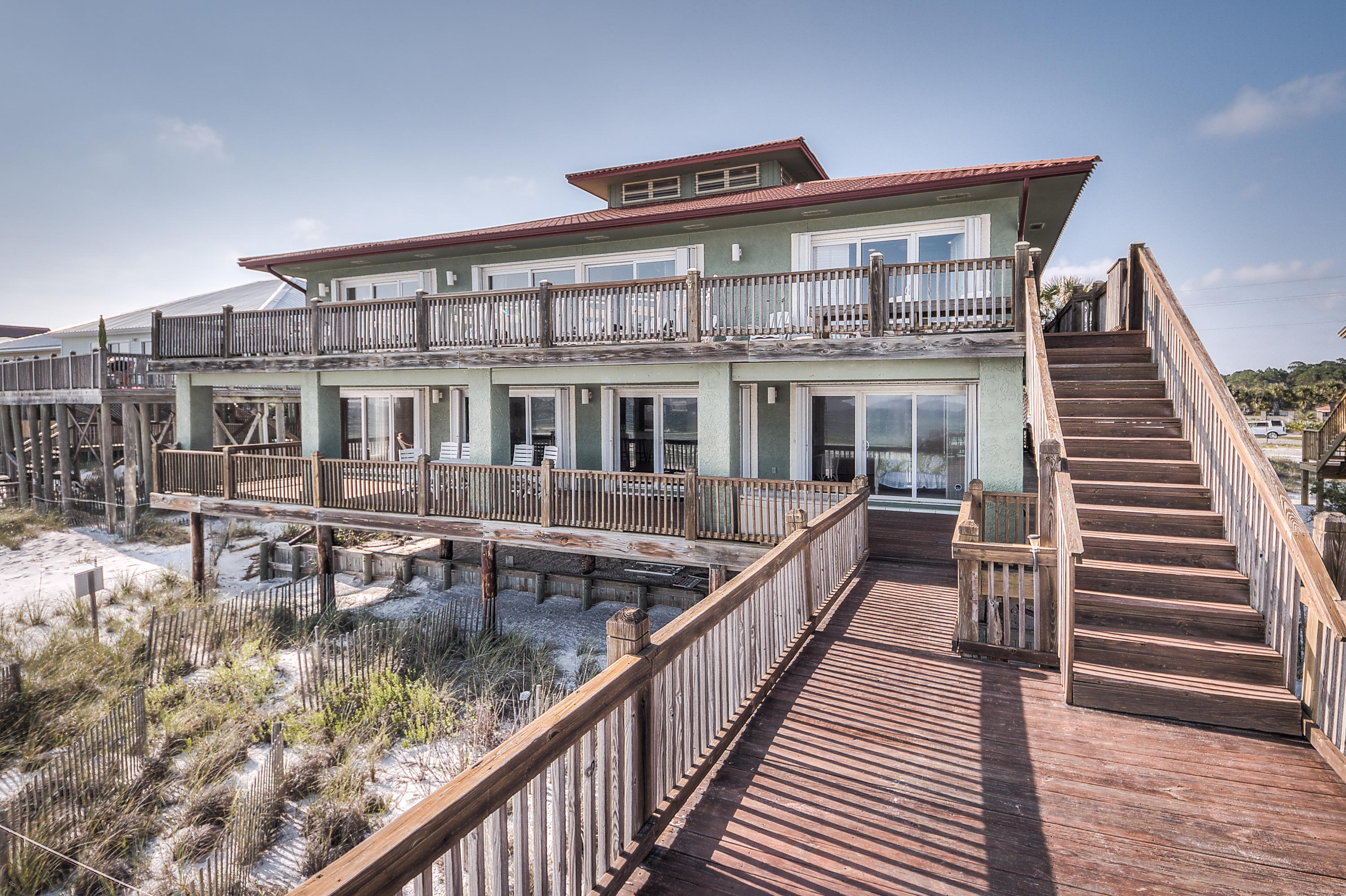 43 Fort Panic Road Santa Rosa Beach, FL 32459 - Photo 2 of 44 a view of a house with wooden deck and a ocean view