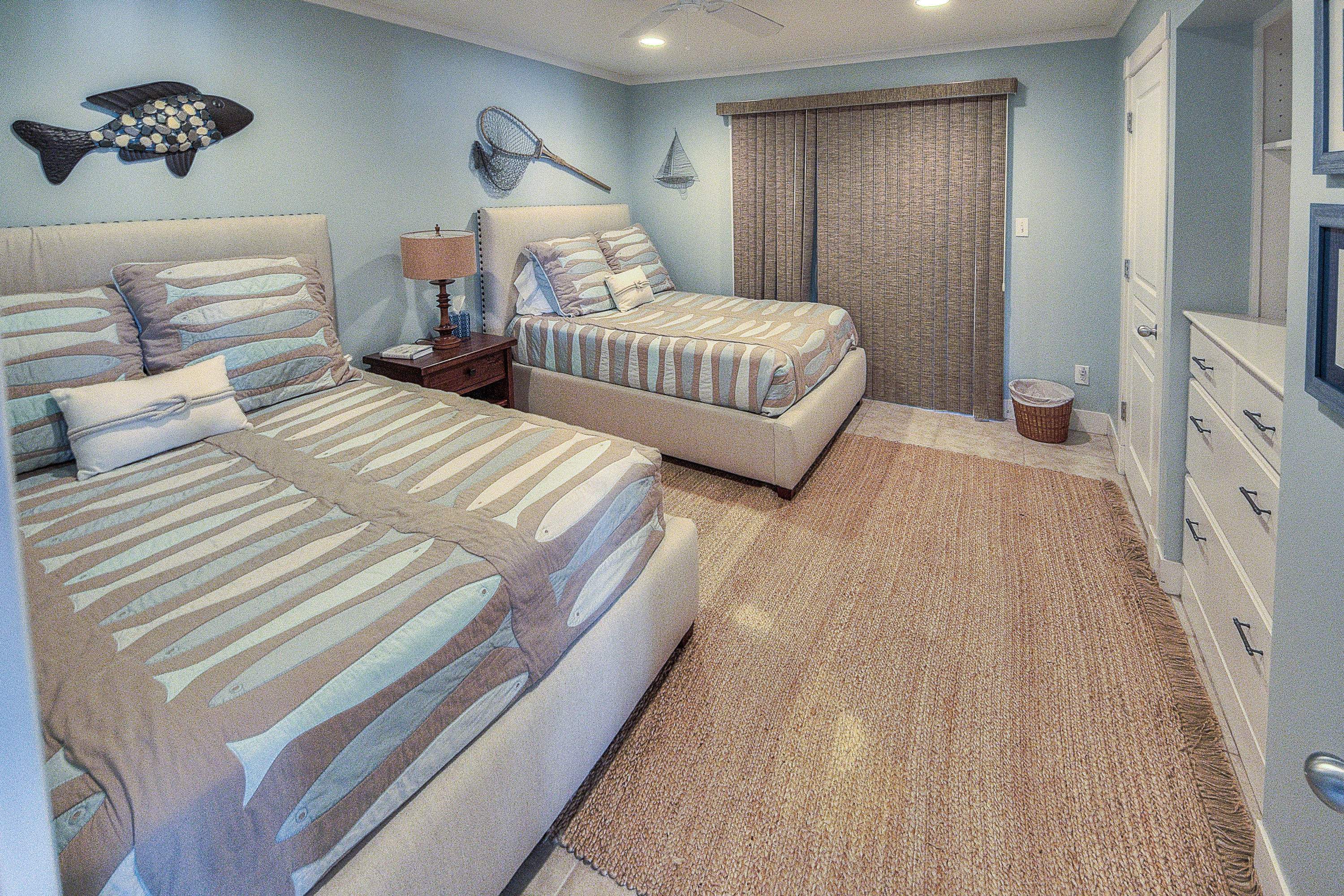 43 Fort Panic Road Santa Rosa Beach, FL 32459 - Photo 29 of 44 a bedroom with two beds and a flat screen tv