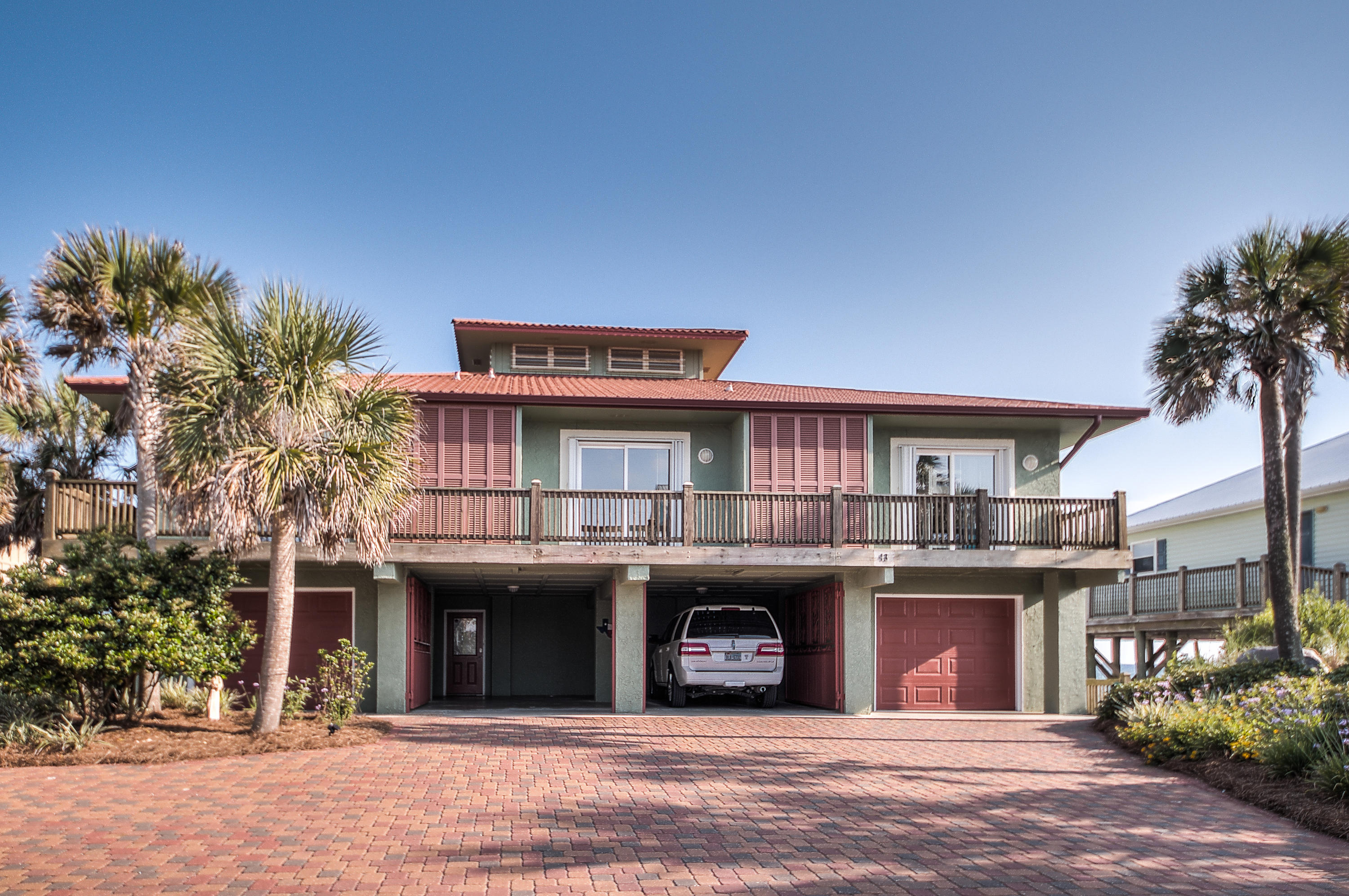 43 Fort Panic Road Santa Rosa Beach, FL 32459 - Photo 44 of 44 a front view of a house with a garden