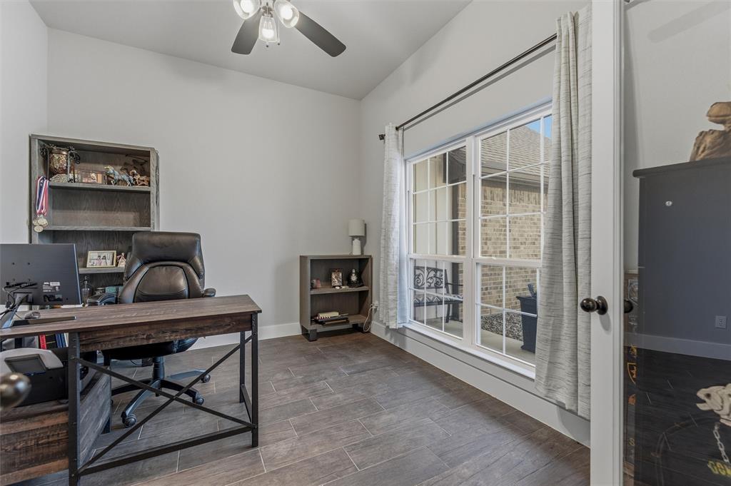 3020 Westfork Way Springtown, TX 76082 - Photo 23 of 40 a view of a workspace with furniture and a window