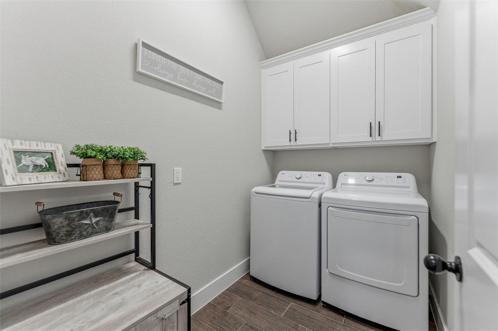 3020 Westfork Way Springtown, TX 76082 - Photo 24 of 40 a view of storage and utility room with washer and dryer