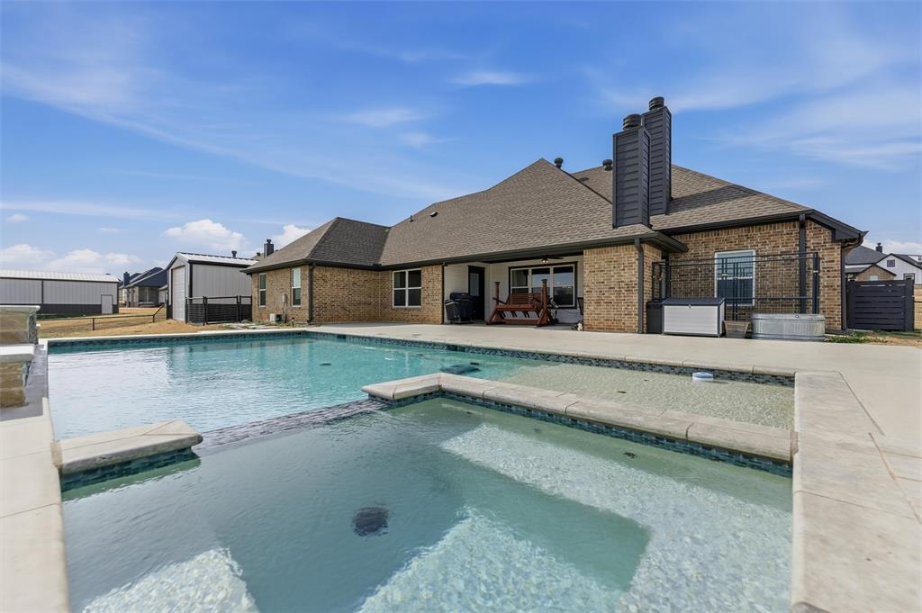 3020 Westfork Way Springtown, TX 76082 - Photo 28 of 40 a front view of a house with a yard