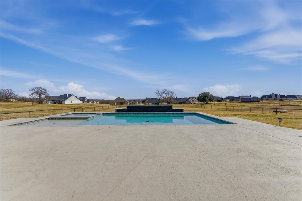 3020 Westfork Way Springtown, TX 76082 - Photo 31 of 40 a view of a swimming pool and an outdoor seating