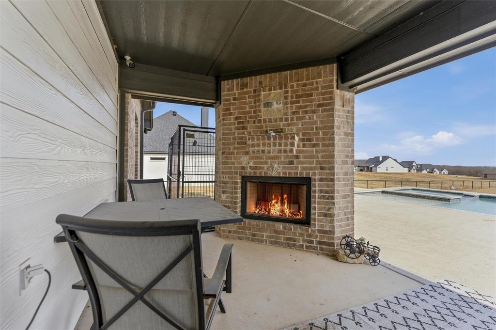 3020 Westfork Way Springtown, TX 76082 - Photo 33 of 40 a view of a livingroom with furniture and a fireplace