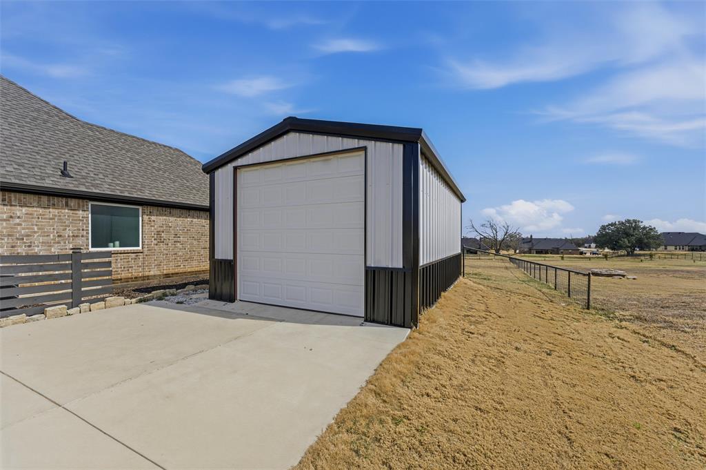 3020 Westfork Way Springtown, TX 76082 - Photo 35 of 40 a view of a house with a backyard