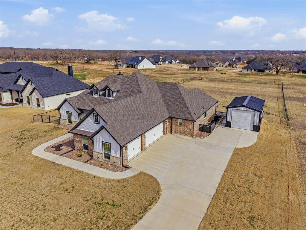 3020 Westfork Way Springtown, TX 76082 - Photo 4 of 40 an aerial view of a house with a ocean view