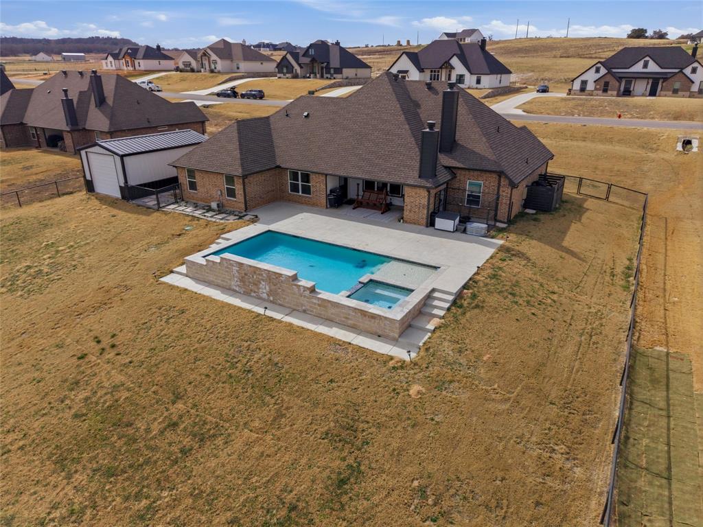 3020 Westfork Way Springtown, TX 76082 - Photo 9 of 40 a view of a yard in front of house