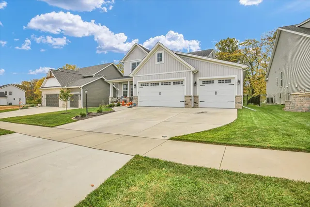 a view of a house with outdoor space and porch area