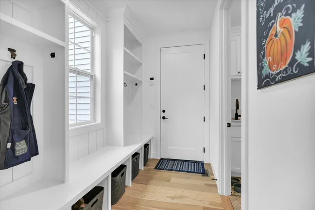 a bed room with a bed and a book shelf