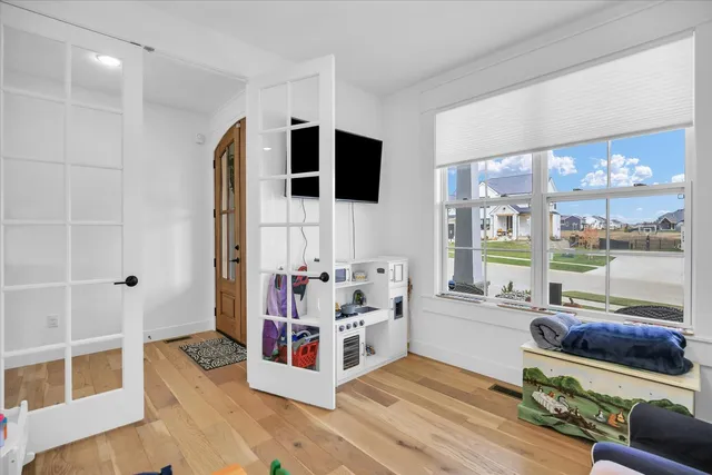 a view of a hallway with windows