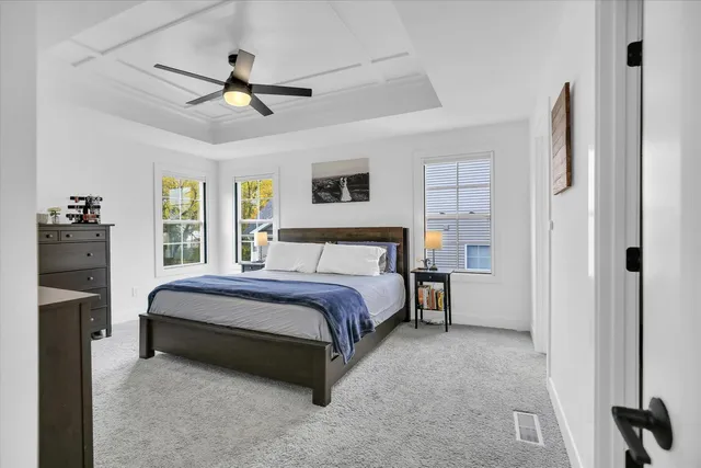 a bathroom with a double vanity sink and mirror