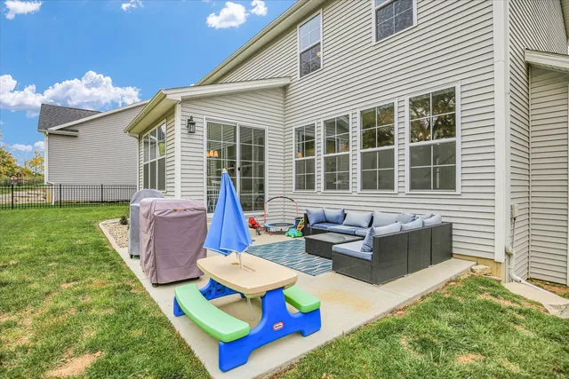 a view of a house with a back yard