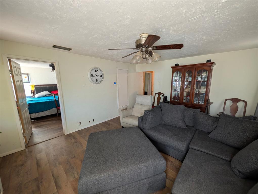 308 Short Street Mansfield, TX 76063 - Photo 4 of 21 a living room with furniture and a wooden floor
