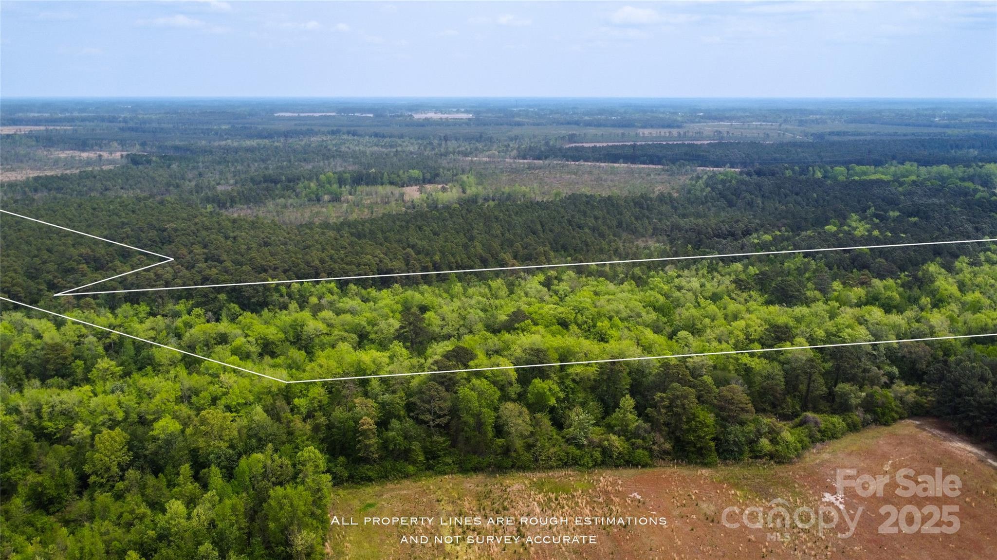 4749 Draughon Road Stedman, NC 28391 - Photo 16 of 22 a view of a balcony with a floor to ceiling window