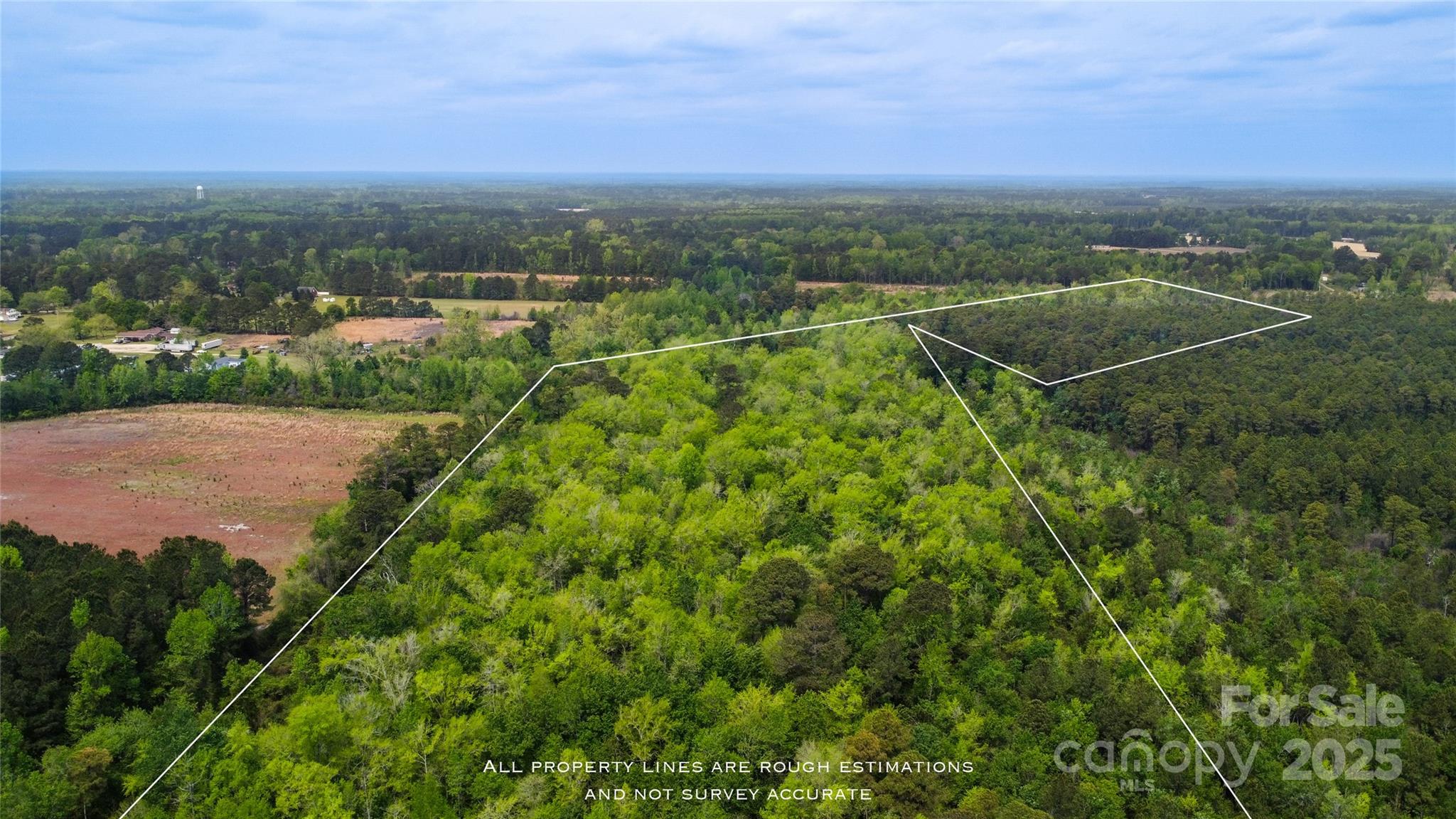 4749 Draughon Road Stedman, NC 28391 - Photo 17 of 22 an aerial view of a houses with a yard