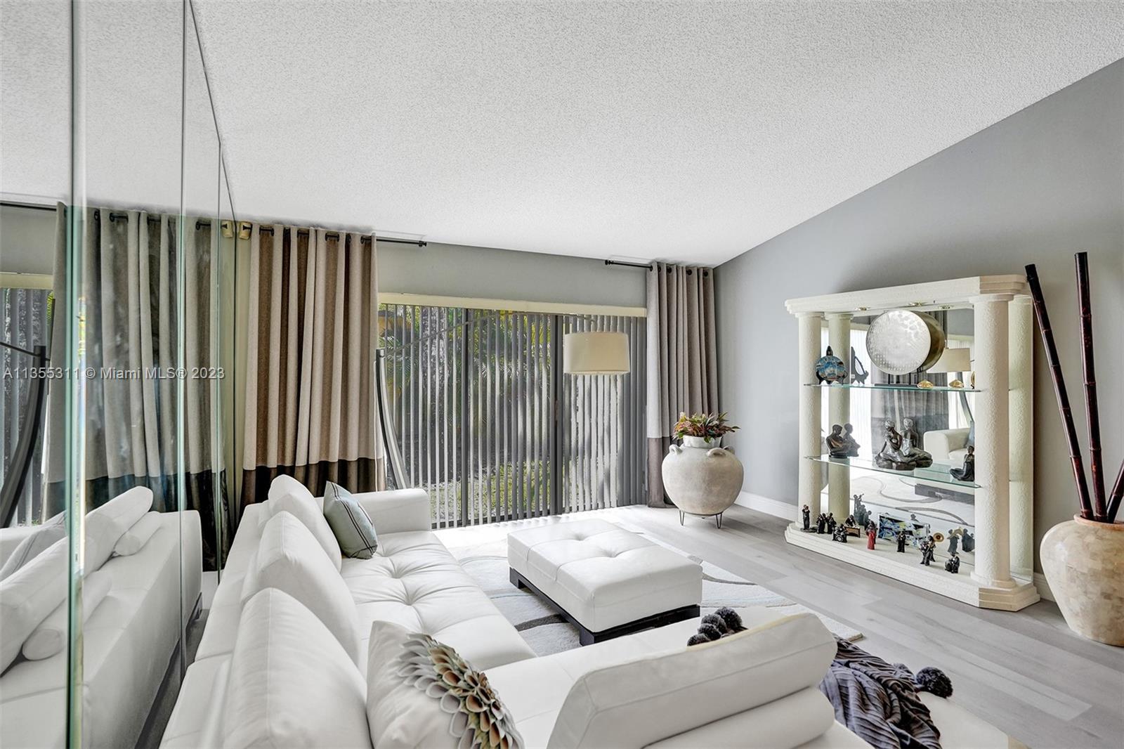 Tamarac Tamarac, FL 33321 - Photo 14 of 49 a bedroom with furniture and a large window