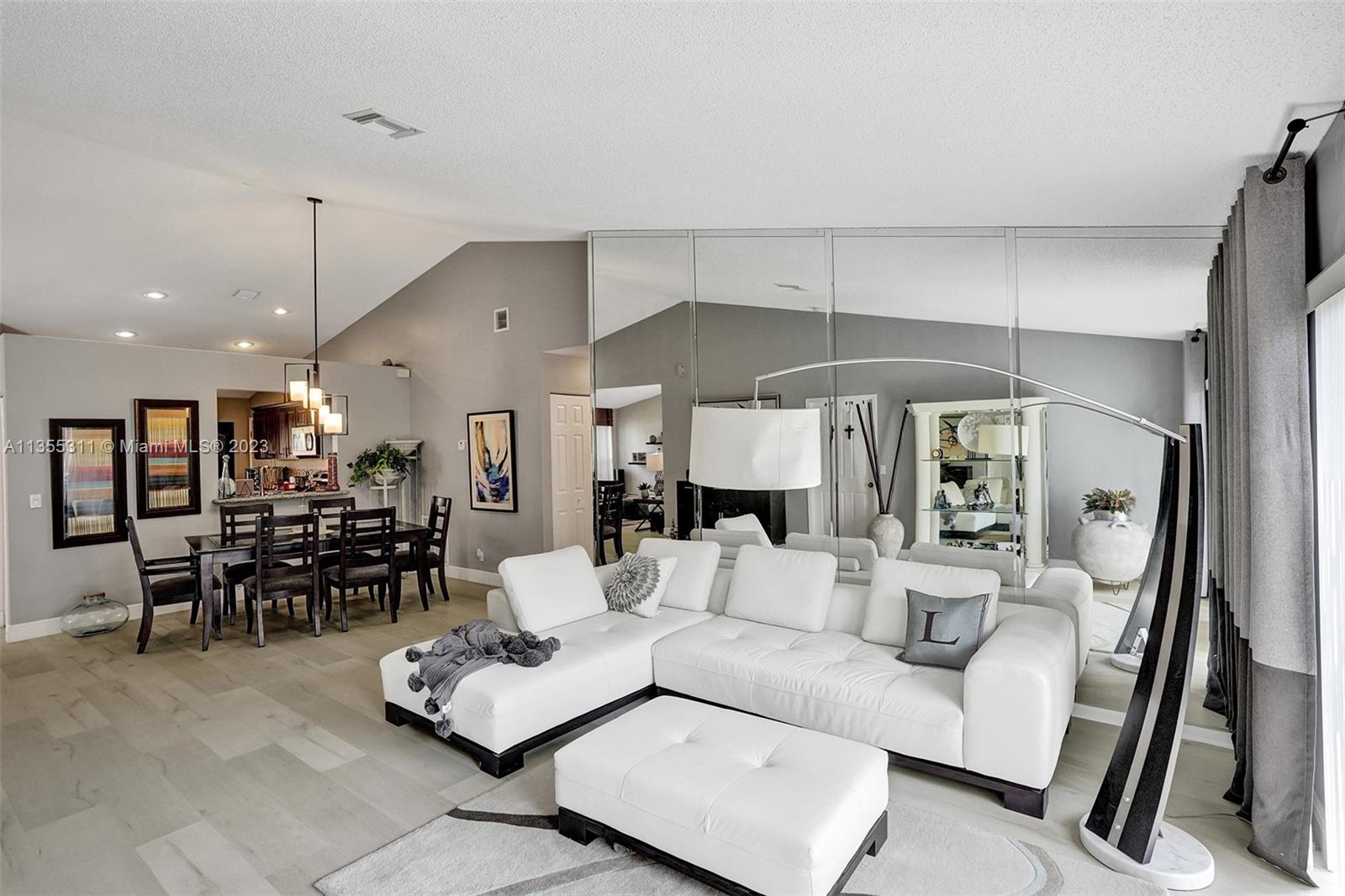 Tamarac Tamarac, FL 33321 - Photo 17 of 49 a living room with furniture and a table