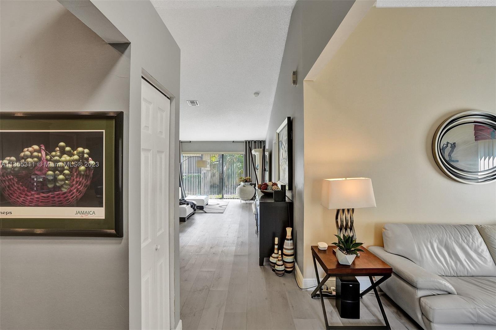 Tamarac Tamarac, FL 33321 - Photo 40 of 49 a living room with furniture