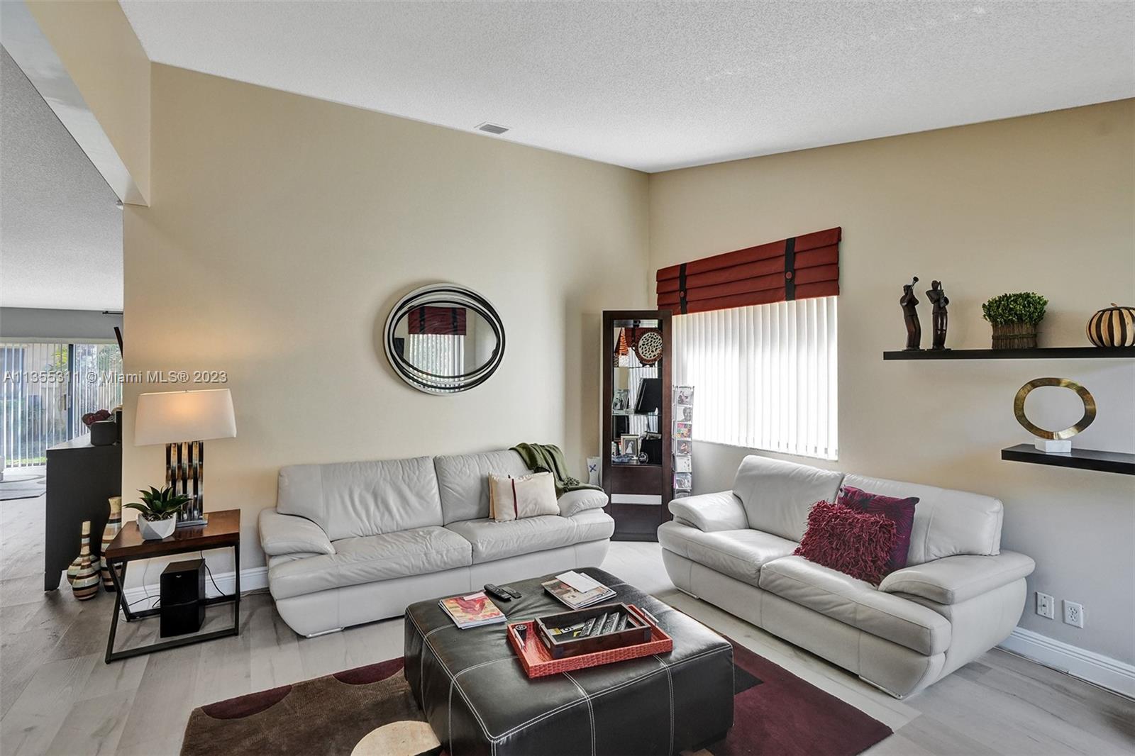 Tamarac Tamarac, FL 33321 - Photo 49 of 49 a living room with furniture and a couch