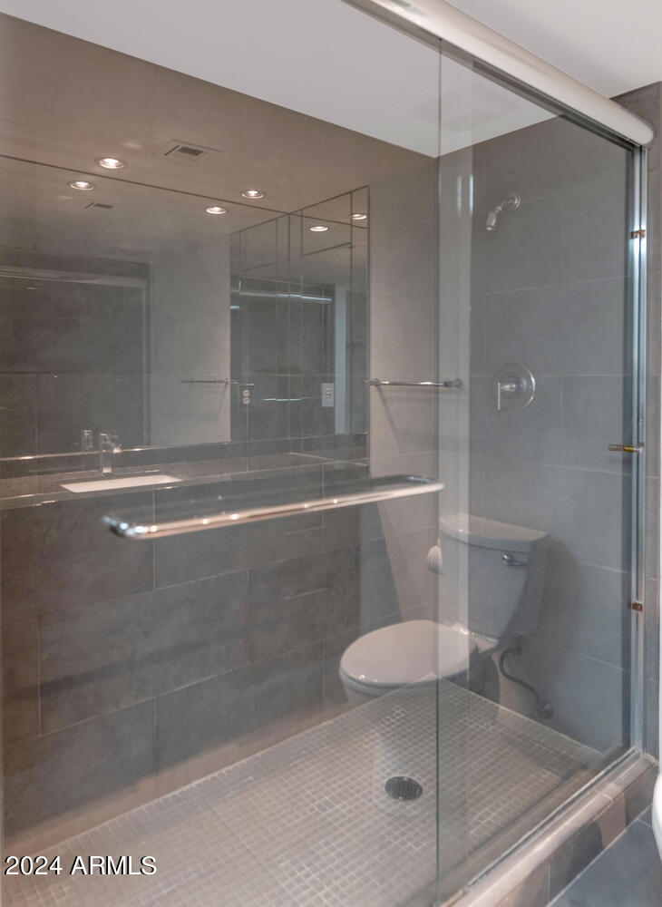 7930 East Camelback Road, Unit 301 Scottsdale, AZ 85251 - Photo 22 of 32 Frameless Shower Door